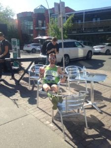 Greg Medwid lounging with a Jugo Juice mid Calgary marathon!